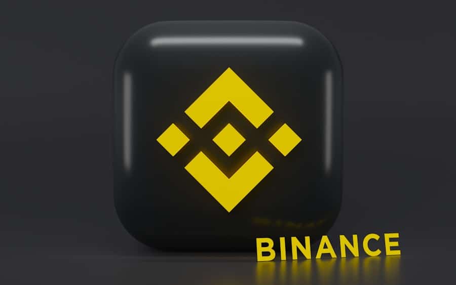 Binance-logotyp på mörk bakgrund.